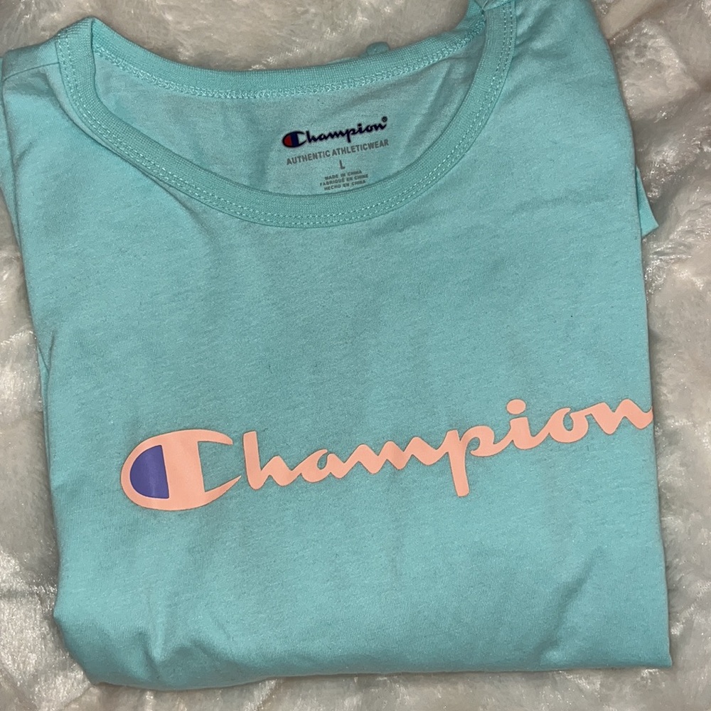 Champion brand front tie long sleeve top. Girl size L. New w tags! Baby blue.